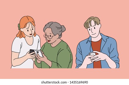 The boy and girl are teaching their grandmother how to use a smartphone. hand drawn style vector design illustrations. 