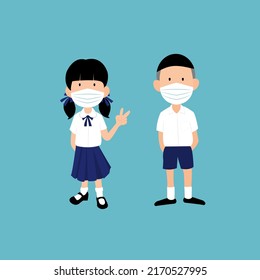 boy and girl wearing school uniforms. They wear Face Masks.  New Normal Activities concept.