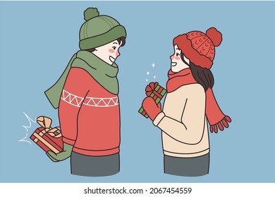 Boy and girl in winter clothes feel excited make surprise for Valentine Day. Smiling couple lovers prepare gifts or presents for New Year or Christmas holiday celebration. Vector illustration. 
