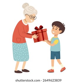 Boy giving a gift to his grandmother. Birthday celebration concept.