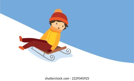 The boy goes down the hill on a sled sitting sideways