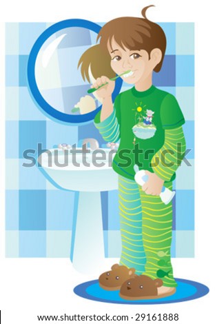 Boy in green pyjamas cleans teeth