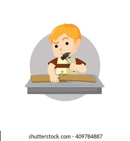 Boy hammering wood