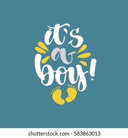 It's a boy! Hand written calligraphy poster. Brush lettering white grey color on cute blue background with footprint of baby. Poster or greeting card, invitation on baby shower.