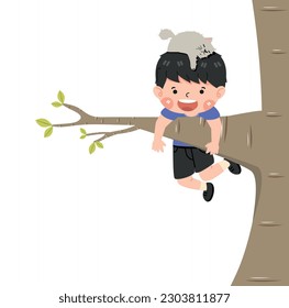 Boy hanging on a tree branch