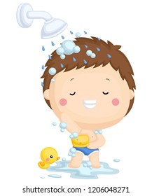 a boy happily showering with a duck toy