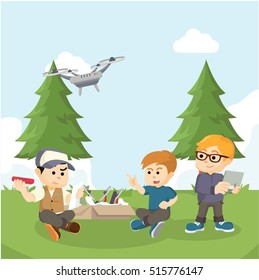 boy helping friend  to assemble drone