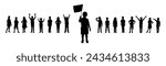 Boy holding flag in front of group of children vector silhouette. Little kid standing and waving flag in front of group of happy kids black silhouette.	