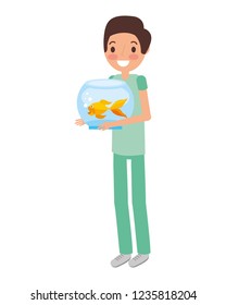 boy holding goldfish on bowl