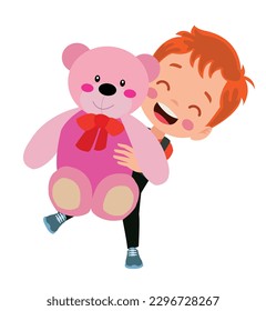 A boy is holding a pink teddy bear