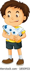Niño sujetando la ilustración de un juguete de cohete