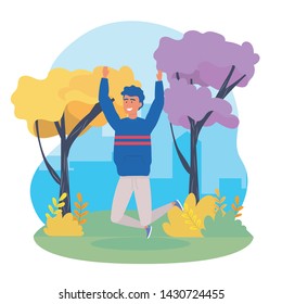 boy jumping with casual clothes and trees