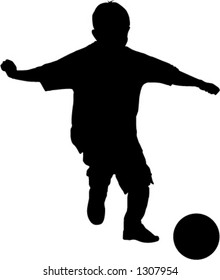 boy kicking soccerball