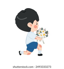 Boy kneels with flowers in hand