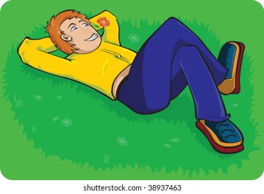 Boy lay down on summer grass