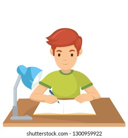 A boy learn on the desk before exam tomorrow