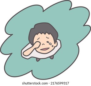 A boy looking up and trying to endure crying