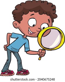 boy looks enthusiastically through a magnifying glass