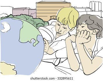 The boy looks at the globe, geography lesson