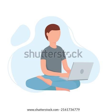 Boy in lotus position keeping calm and worling on laptop or computer. Meditation pose. Smm manager, programmer. Freelancer working on web and application development on computers. Software developers.