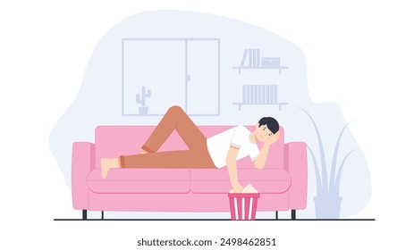 boy lying on the couch watching tv