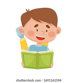 Boy Lying on the Floor with Open Book and Reading Vector Illustration