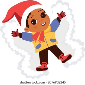 Boy lying on ground. Kid making snow angel. Child enjoyng snowfall