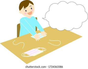 boy making handmade mask and speech balloon