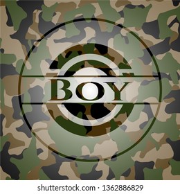 Boy on camouflage texture