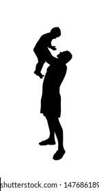 the boy on hands at the father a silhouette