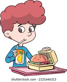 niño en el almuerzo bebe jugo en la paja