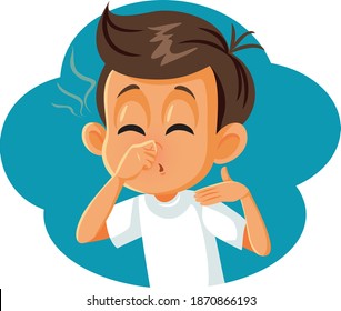 Boy Pinching his Nose Covering Bad Smell. Funny child feeling unhappy about something stinky
