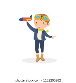A boy playing with the airplane toy 