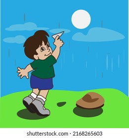 un niño jugando solo en una colina verde