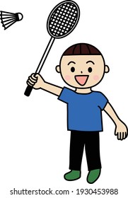 The boy is playing badminton happily