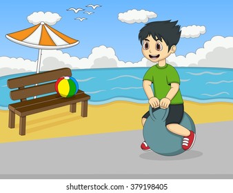 Boy playing bouncing ball in the beach