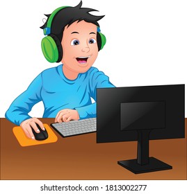 boy playing at computer on a white background