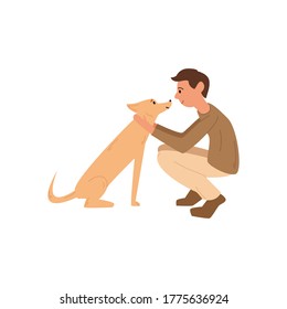 Niño jugando con un perro