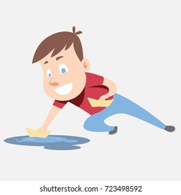 boy playing paper ship