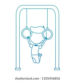 boy playing in park playground rings hanging