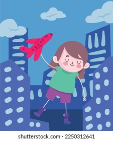 boy playing with plane in the city