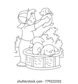 Boy playing with puppies