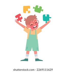 boy playing with puzzles, autism day
