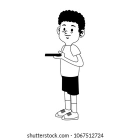 Boy playing with smartphone on black and white