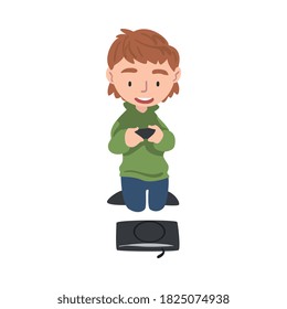 Boy Playing Video Games on Console, Cute Kid Holding Game Controller Cartoon Style Vector Illustration