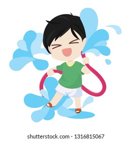 Boy playing with  Water hose