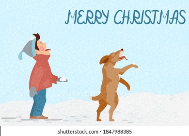 A boy plays with a dog in winter, taste the snow on his tongue. Lettering: Merry Christmas. Winter games with a pet.