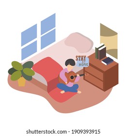a boy plays guitar during quarantine in his room