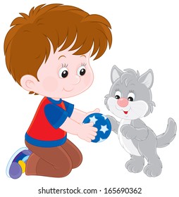 boy plays with his kitten