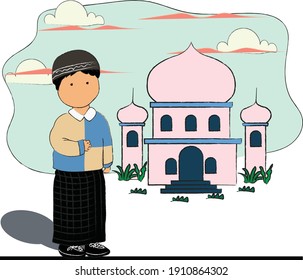 a Boy pray in the mosque. The mosque is very beautiful.